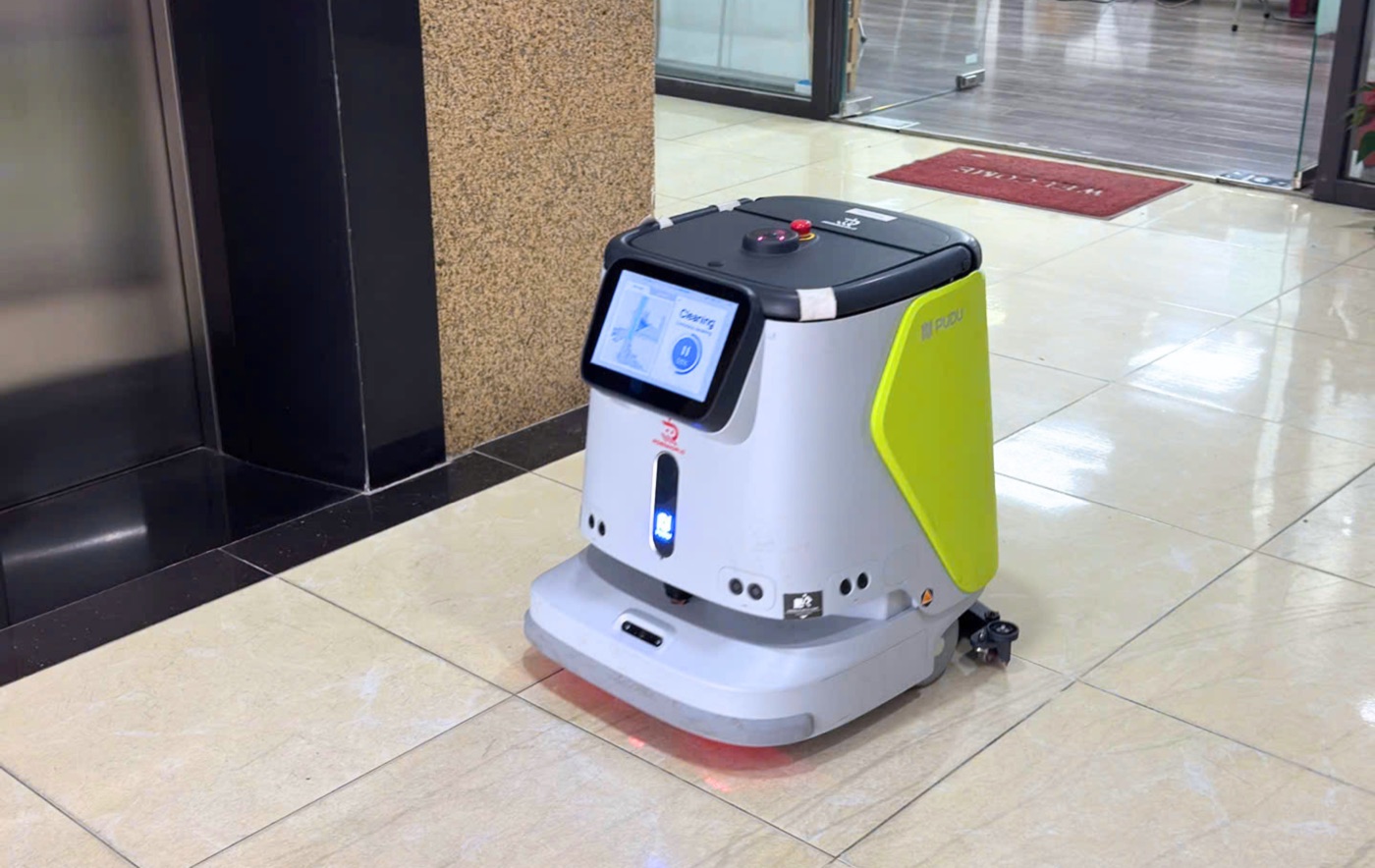 Robot lau sàn nhà xưởng công nghiệp — chọn đúng máy theo diện tích (PUDU SH1/MT1/CC1)
